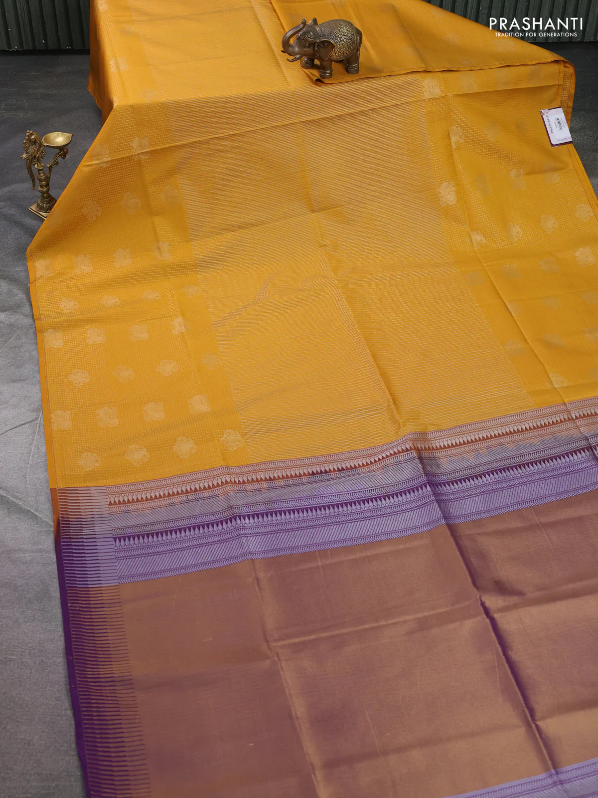 Semi soft silk saree mustard yellow and purple with allover zari weaves & buttas and long zari woven butta border - Image 2