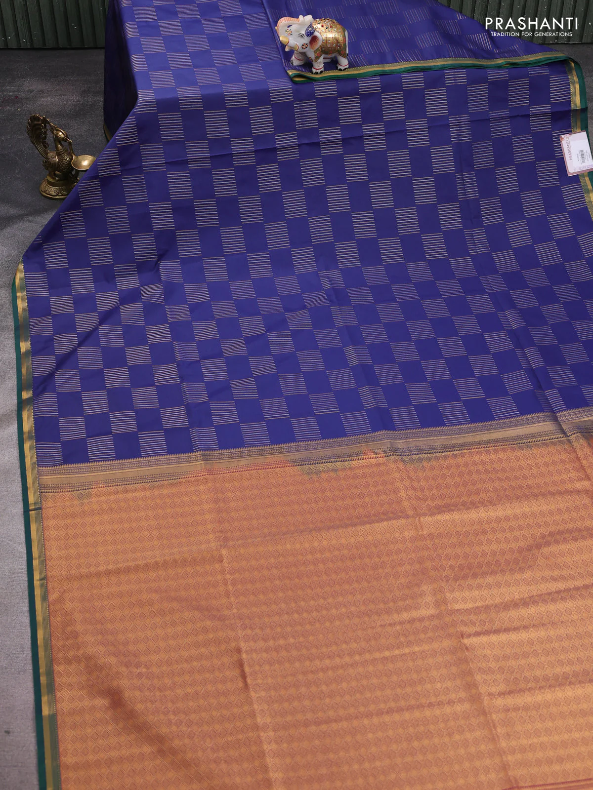 Semi soft silk saree navy blue and dual shade of rust with allover zari woven buttas and zari woven border - Image 2