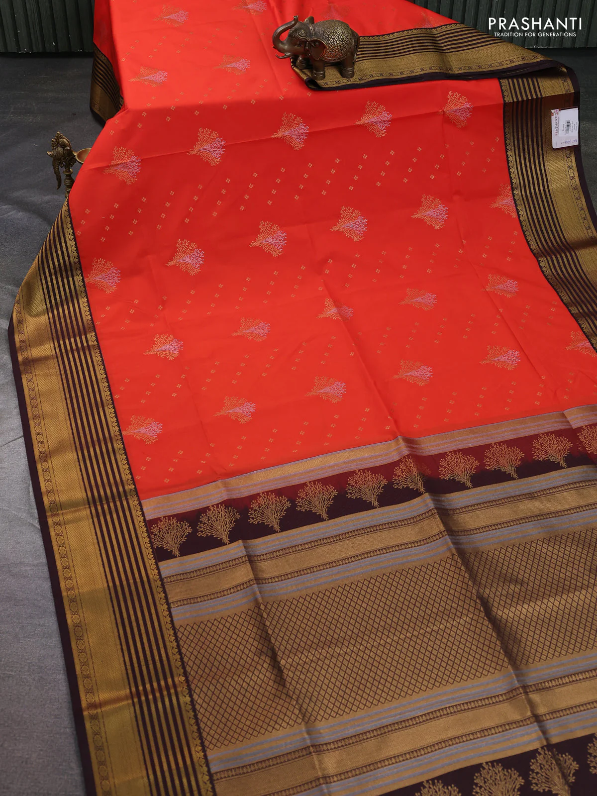 Semi soft silk saree orange and coffee brown with allover zari woven buttas and zari woven korvai border - Image 2