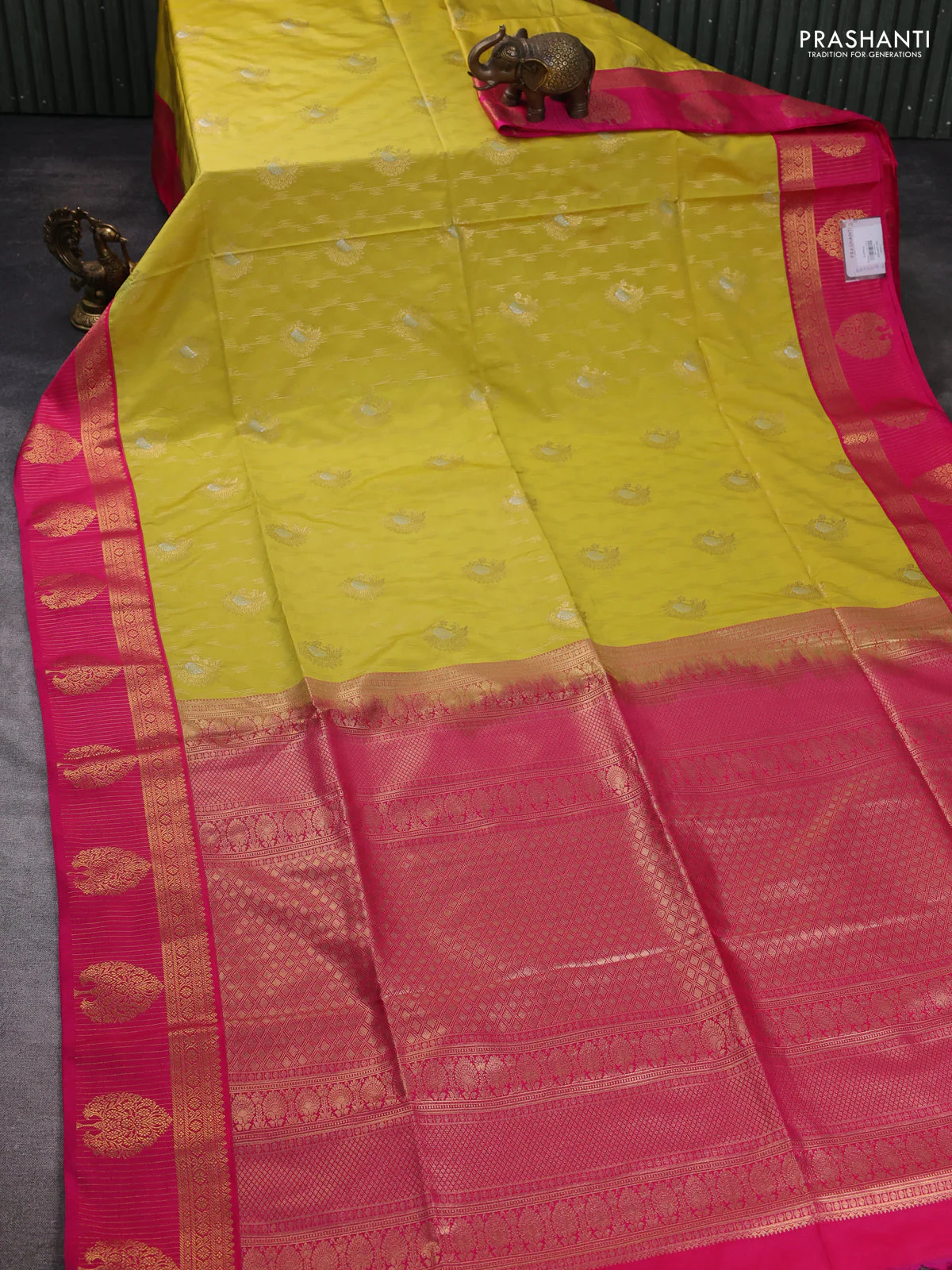 Semi soft silk saree pale yellow and pink with allover zari woven buttas and zari woven korvai border - Image 2