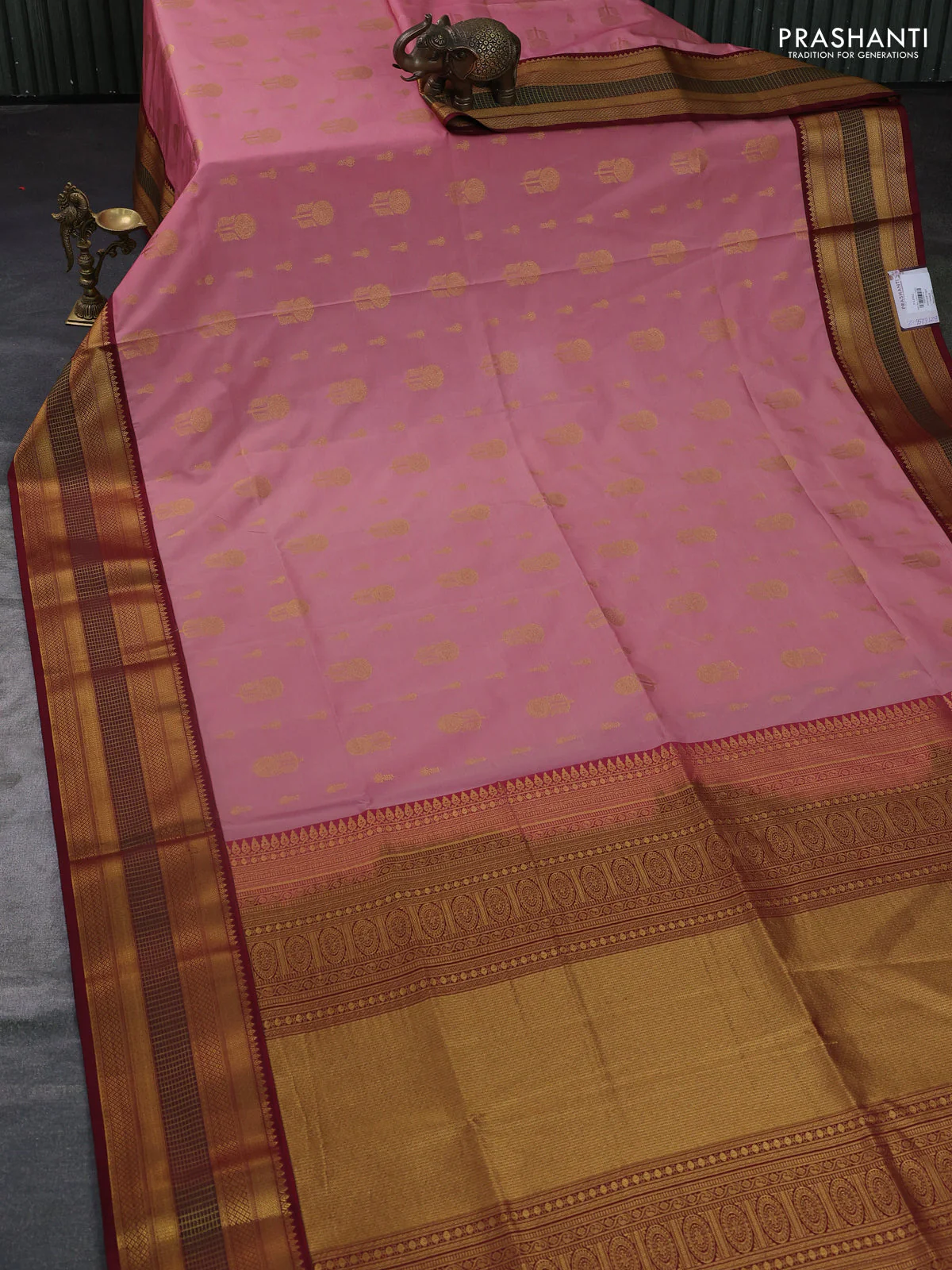 Semi soft silk saree peach pink and deep maroon with allover zari woven buttas and zari woven border - Image 2