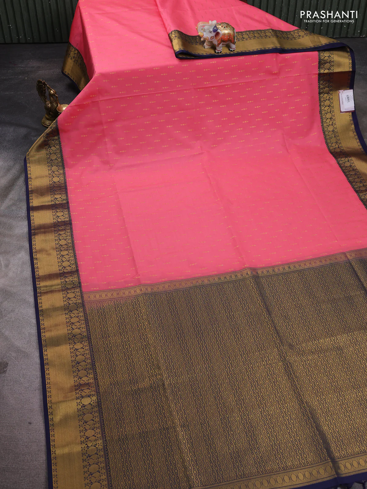 Semi soft silk saree peach pink and navy blue with allover zari woven buttas and zari woven border - Image 2