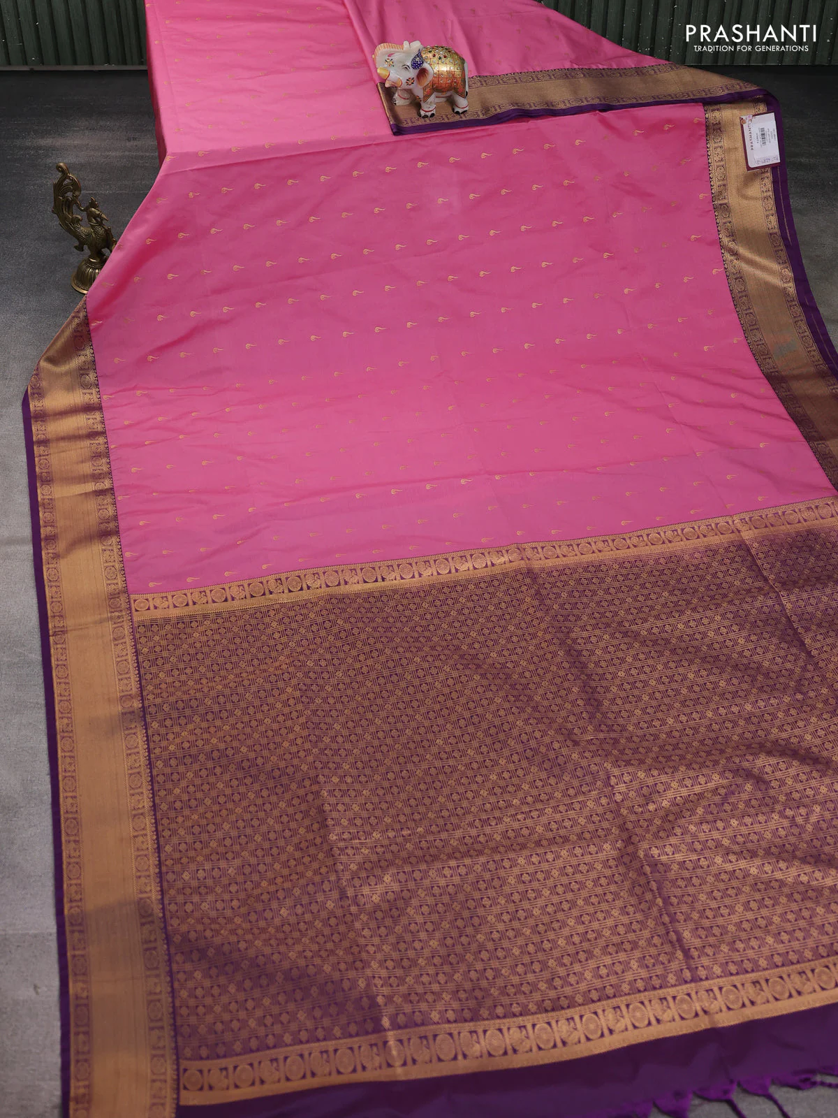 Semi soft silk saree peach pink and purple with allover zari woven buttas and zari woven border - Image 2