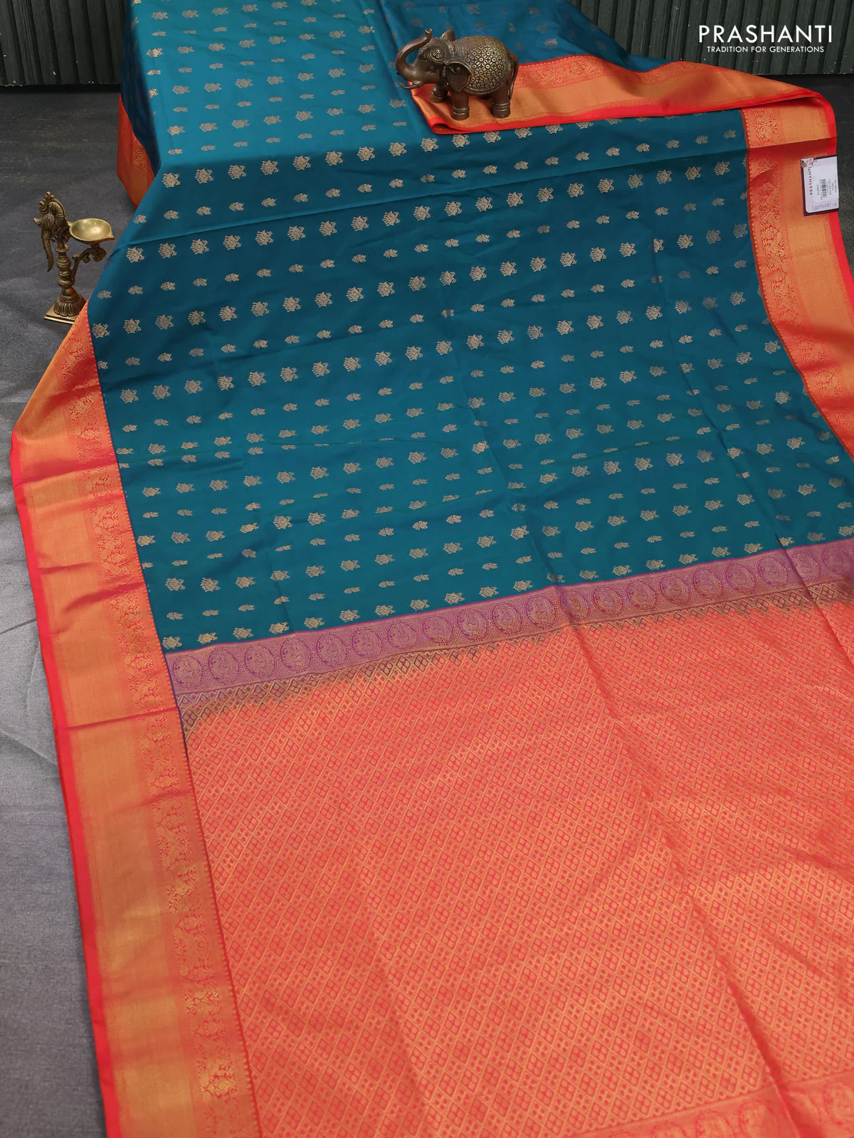 Semi soft silk saree peacock green and orange with allover zari woven buttas and zari woven border - Image 2