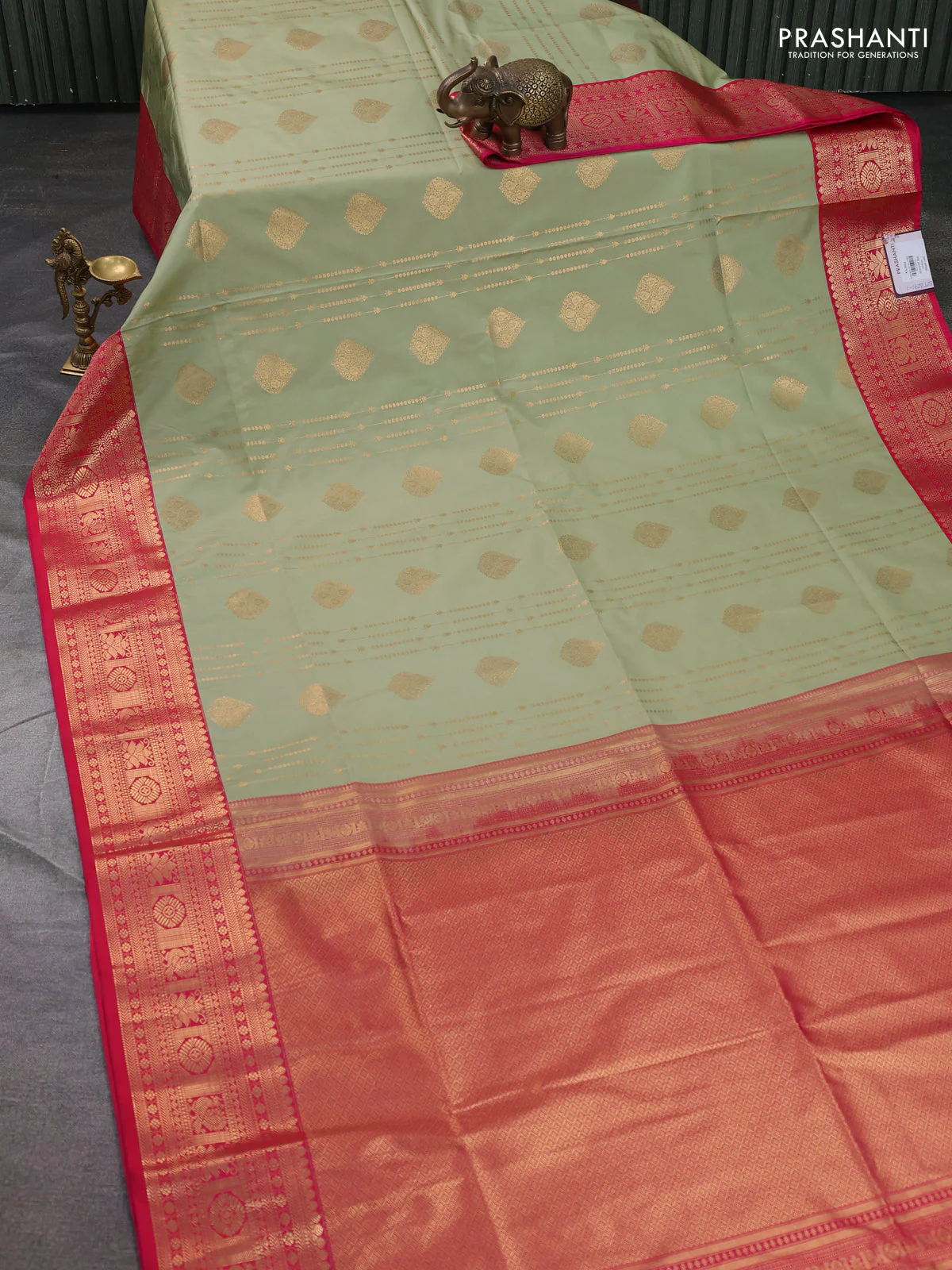 Semi soft silk saree pista green and pink with allover zari weaves & buttas and zari woven border - Image 2