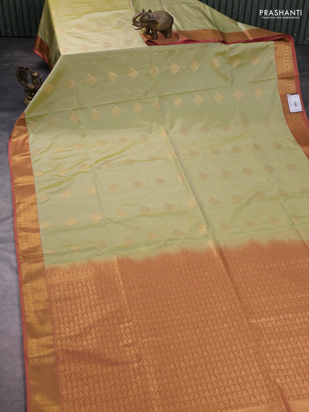 Semi soft silk saree pista green and pink with allover zari woven buttas and zari woven korvai border - Image 2
