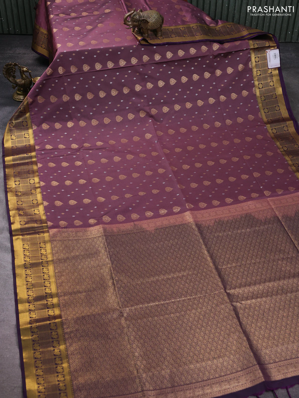 Semi soft silk saree rosy brown and purple with allover zari woven buttas and zari woven border - Image 2