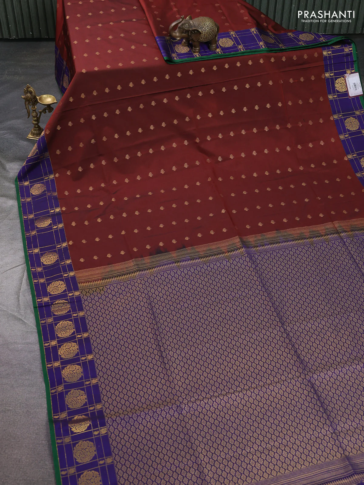 Semi soft silk saree rust shade and blue with allover zari woven buttas and zari woven korvai border - Image 2
