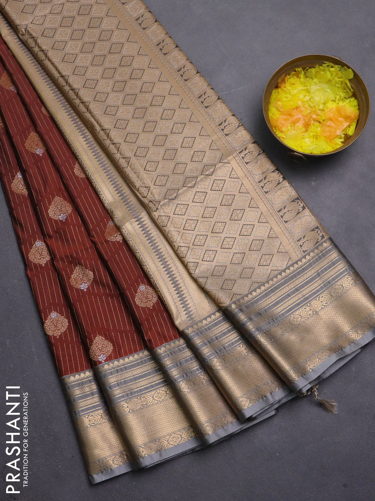 Semi soft silk saree rust shade and grey with allover zari weaves & buttas and zari woven border