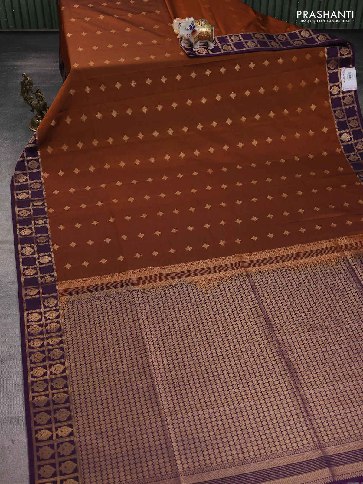Semi soft silk saree rust shade and purple with allover zari woven buttas and rettapet zari woven border - Image 2