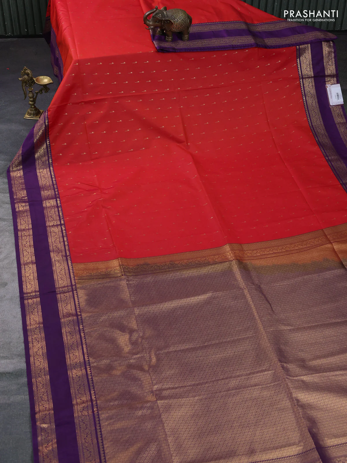 Semi soft silk saree rustic orange and purple with allover zari woven buttas and rettapet zari woven border - Image 2