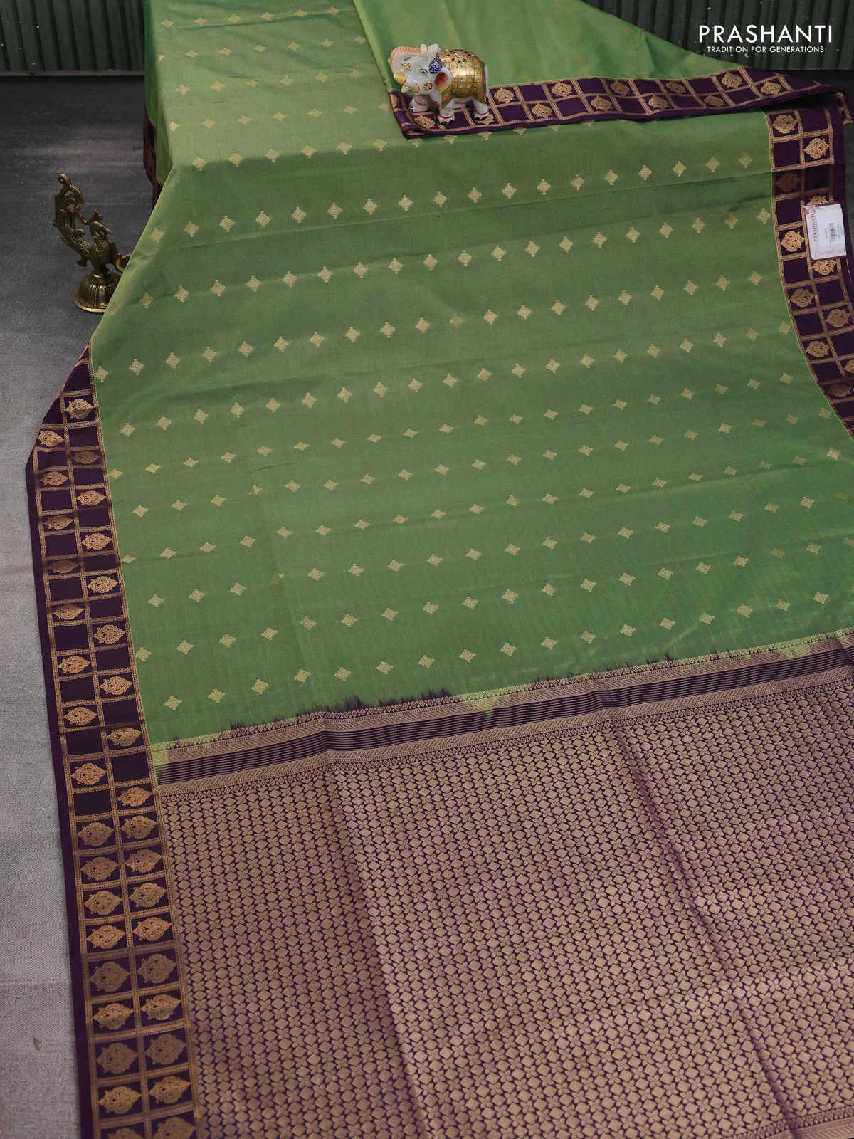Semi soft silk saree sap green and purple with allover zari woven buttas and zari woven border - Image 2