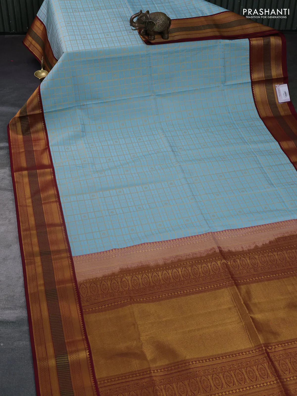 Semi soft silk saree teal blue and deep maroon with allover zari checks & buttas and zari woven border - Image 2