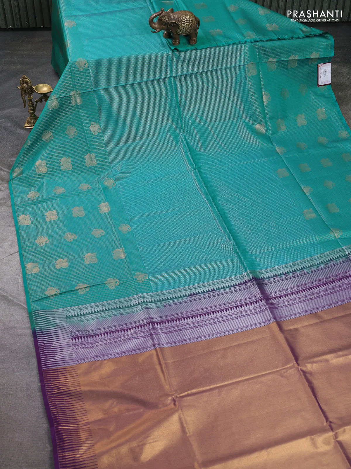 Semi soft silk saree teal blue and purple with allover zari weaves & buttas and long zari woven butta border - Image 2