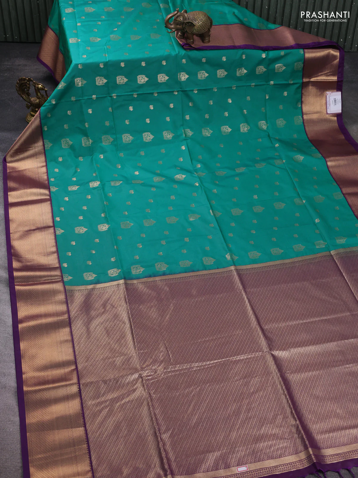Semi soft silk saree teal green and purple with allover zari woven buttas and zari woven korvai border - Image 2