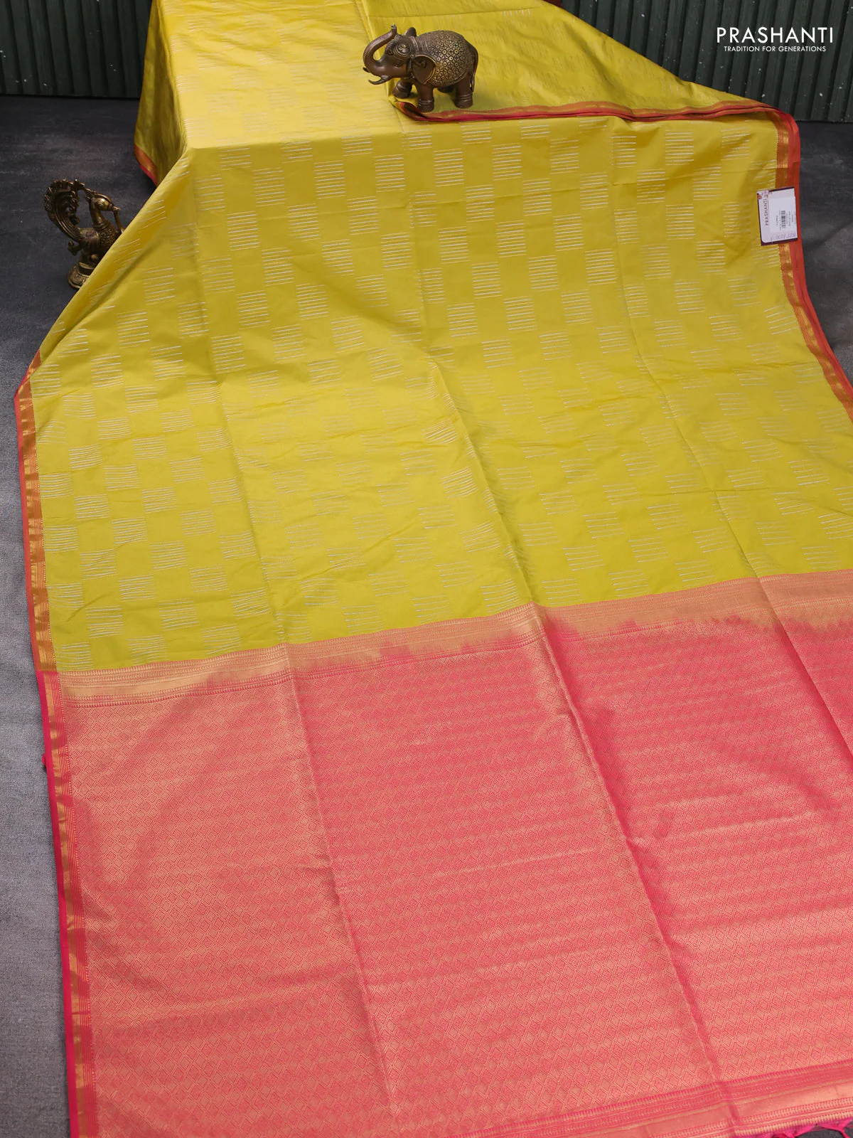 Semi soft silk saree yellow and peach pink with allover silver & gold zari woven buttas and small zari woven border - Image 2