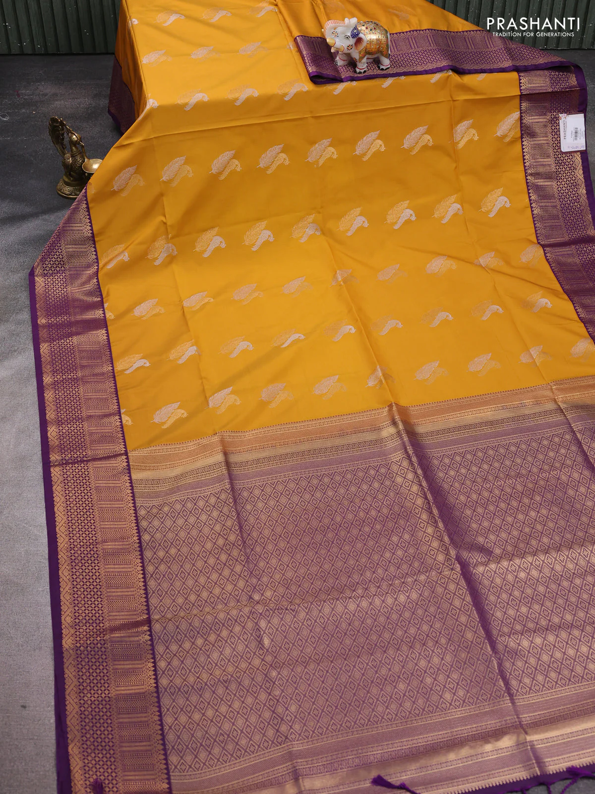 Semi soft silk saree yellow and purple with zari woven buttas and zari woven border - Image 2