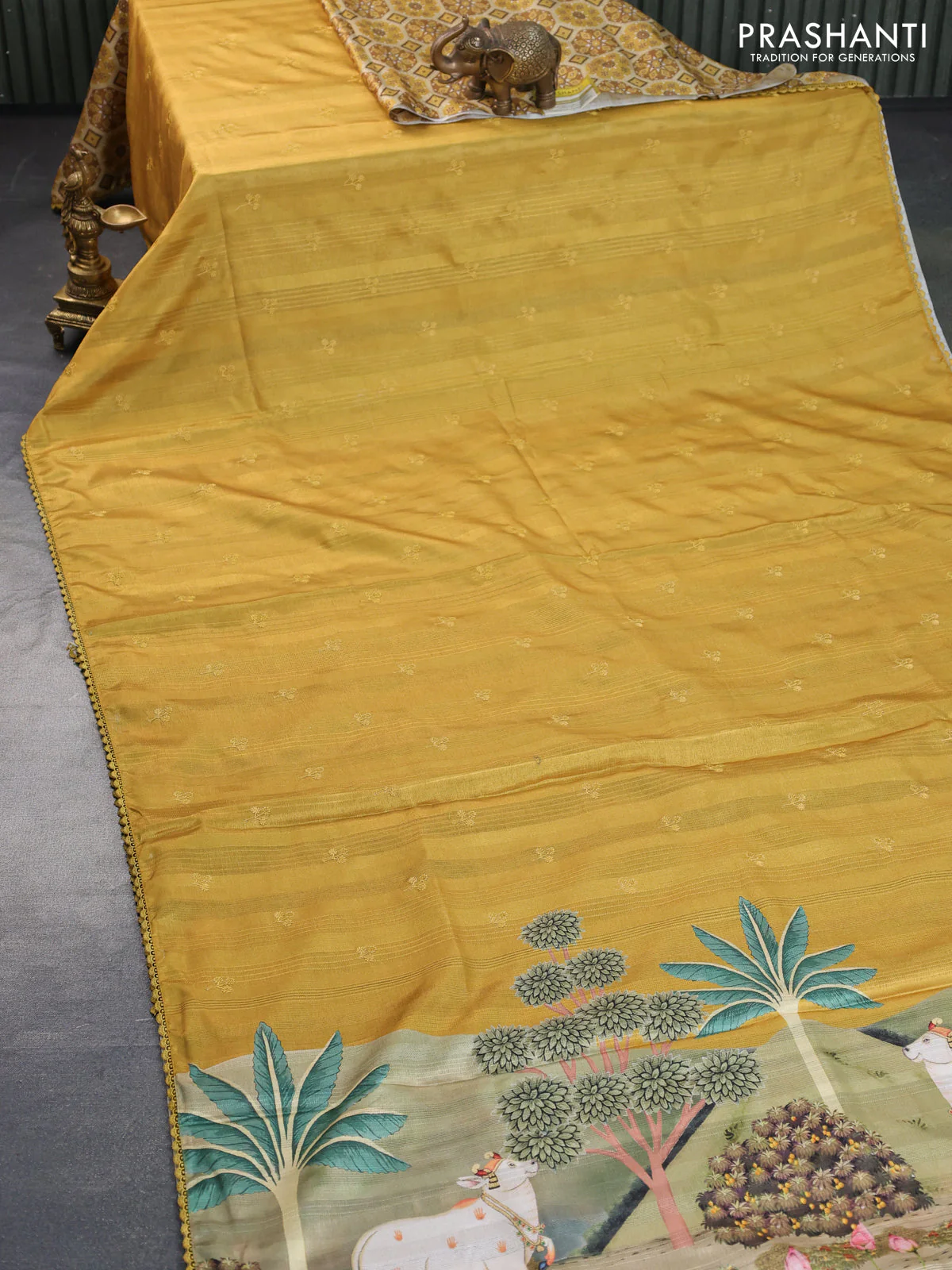Semi tussar partly saree mustard shade with thread woven buttas & ajrakh prints and lace work border & pichwai printed pallu - Image 7