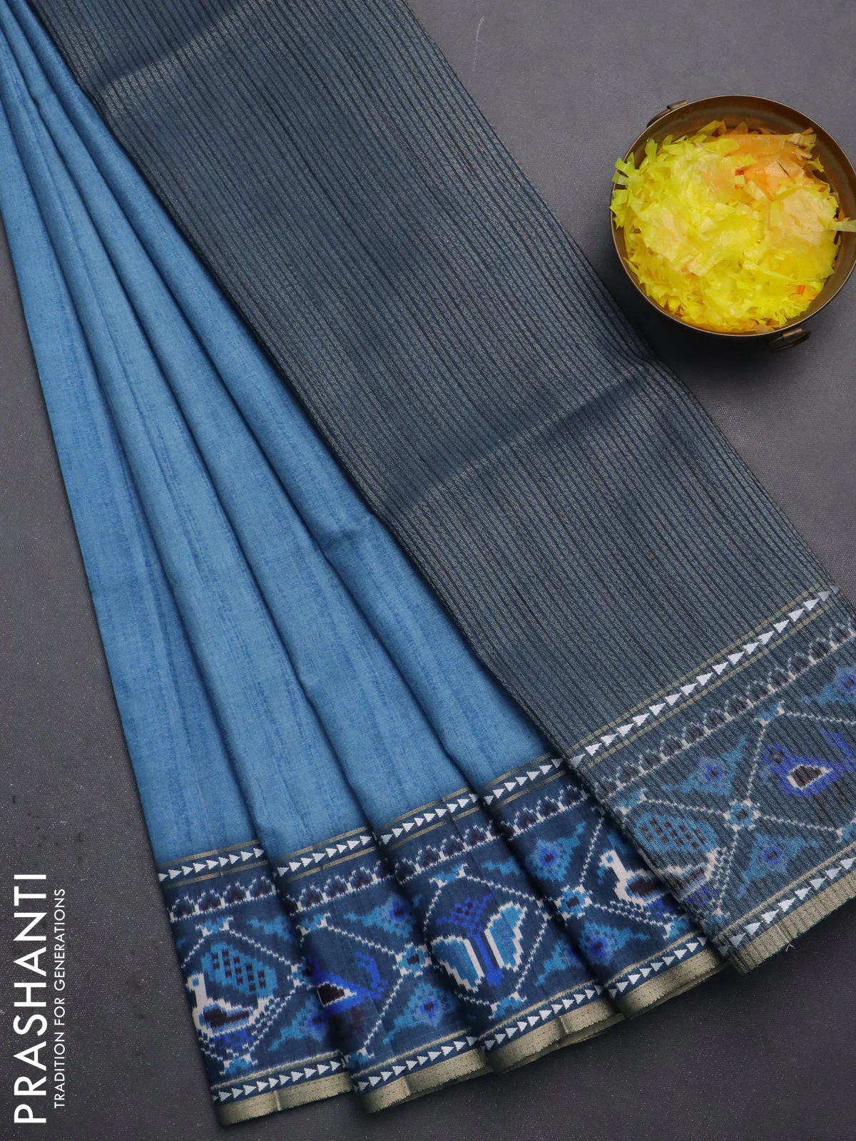 Semi tussar saree blue shade and peacock blue with plain body and patola printed border