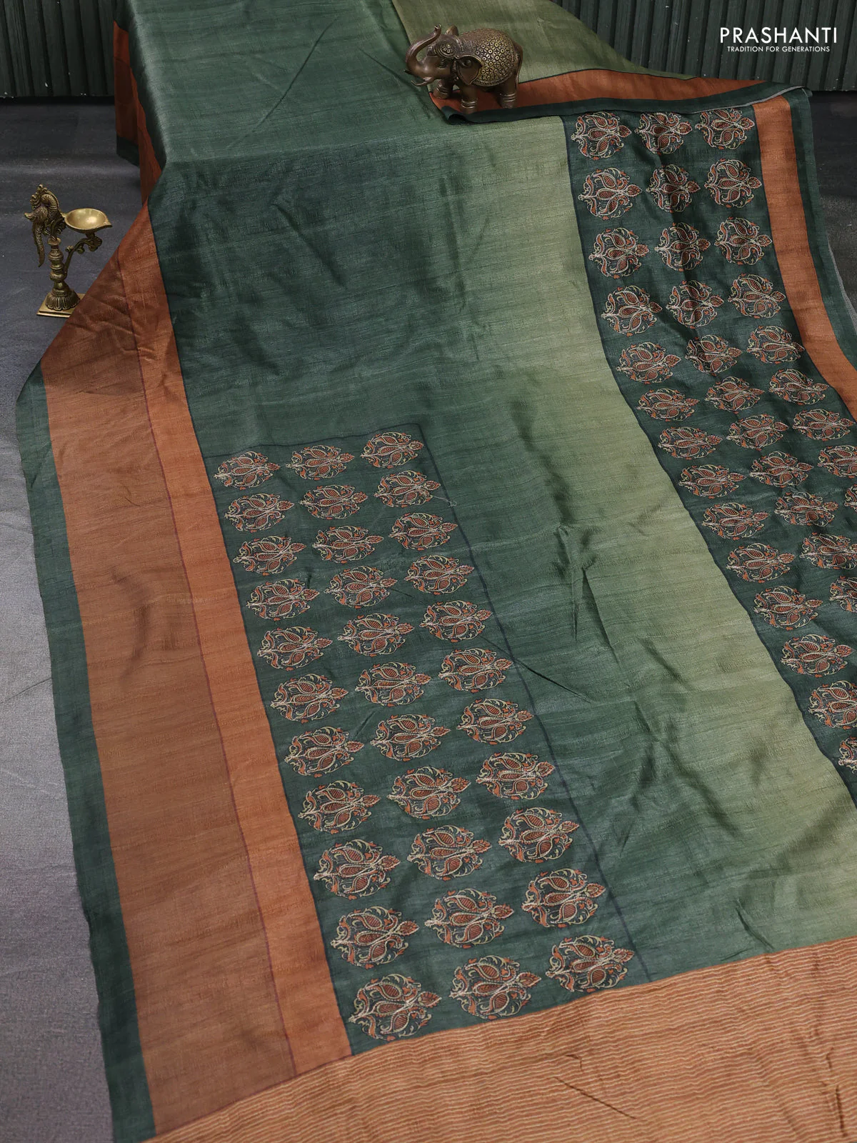 Semi tussar saree dark green and brown with plain body and embroidered pallu - Image 2