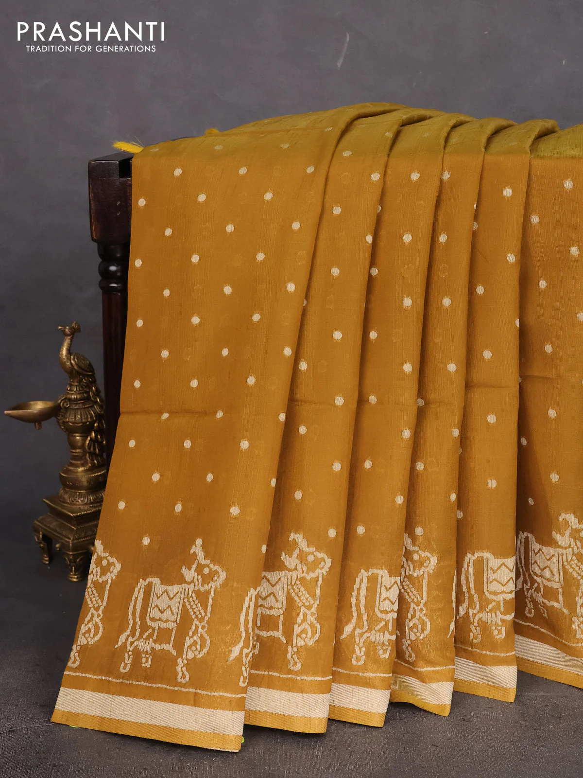 Semi tussar saree dark mustard with allover polka dot weaves and patola weaving pallu