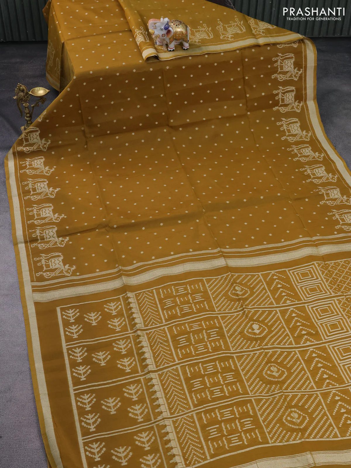 Semi tussar saree dark mustard with allover polka dot weaves and patola weaving pallu - Image 2
