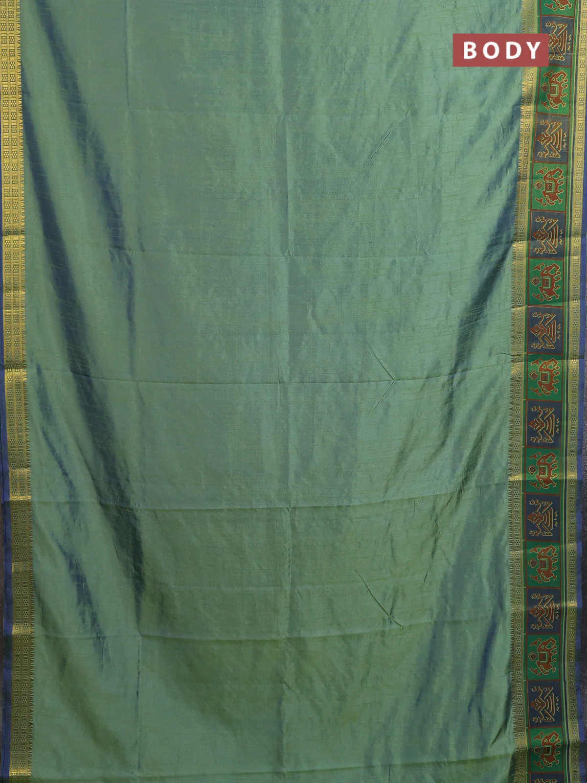 Semi tussar saree dual shade of greenish blue with plain body and ikat woven zari border - Image 2