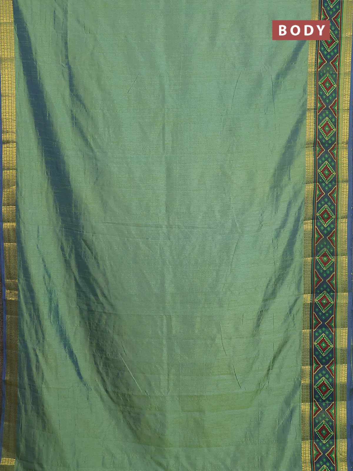 Semi tussar saree dual shade of greenish blue with plain body and ikat woven zari border - Image 2