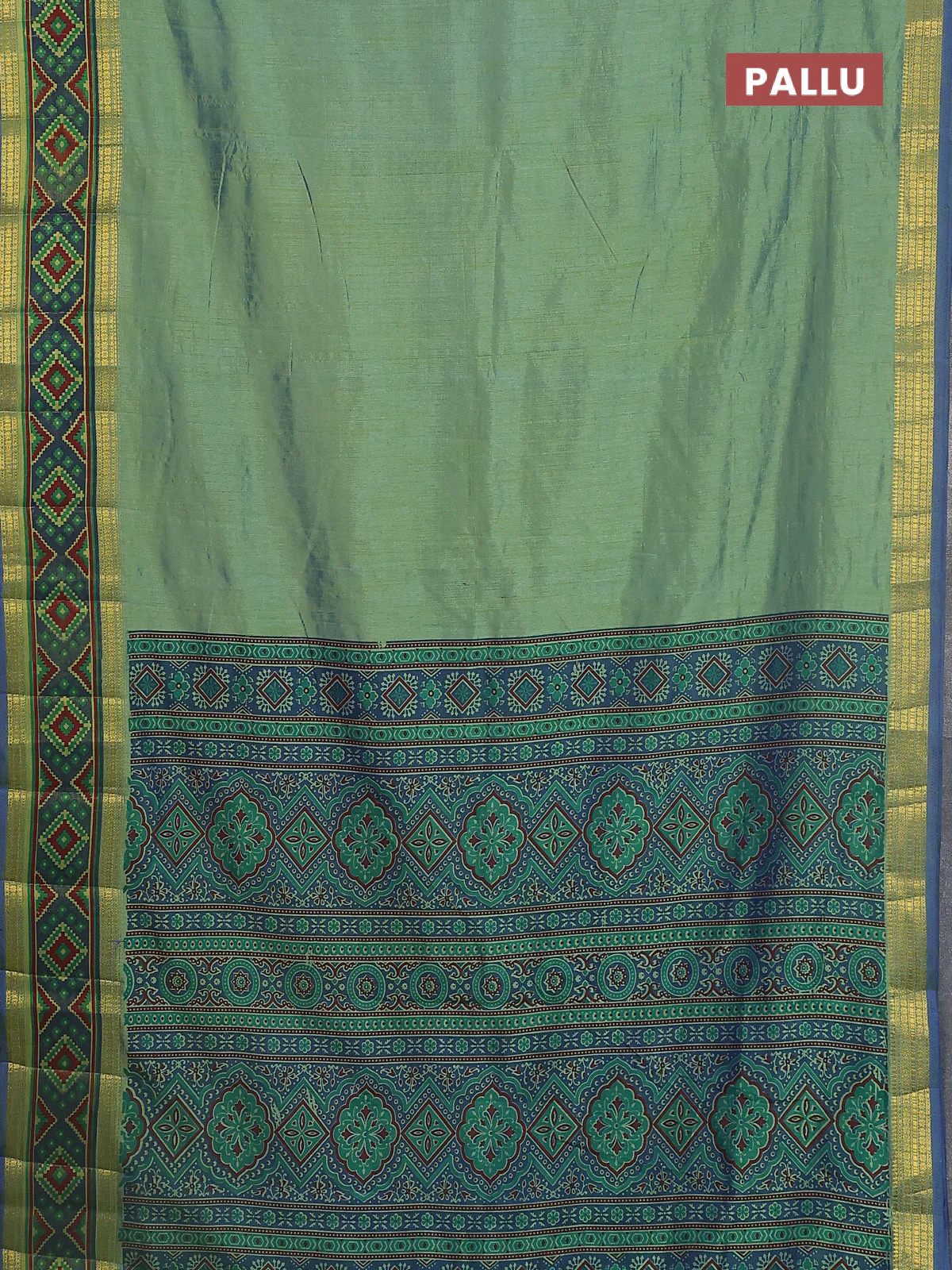 Semi tussar saree dual shade of greenish blue with plain body and ikat woven zari border - Image 3