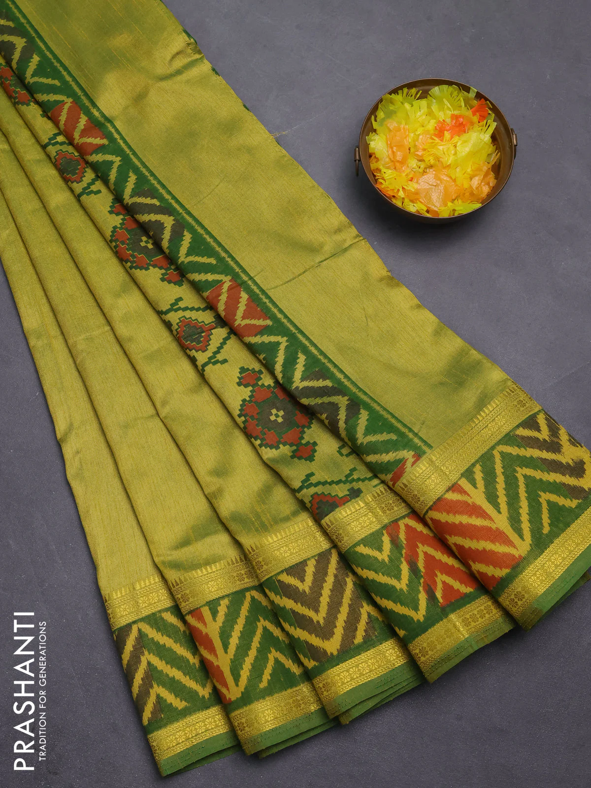 Semi tussar saree dual shade of light green with plain body and ikat woven zari border