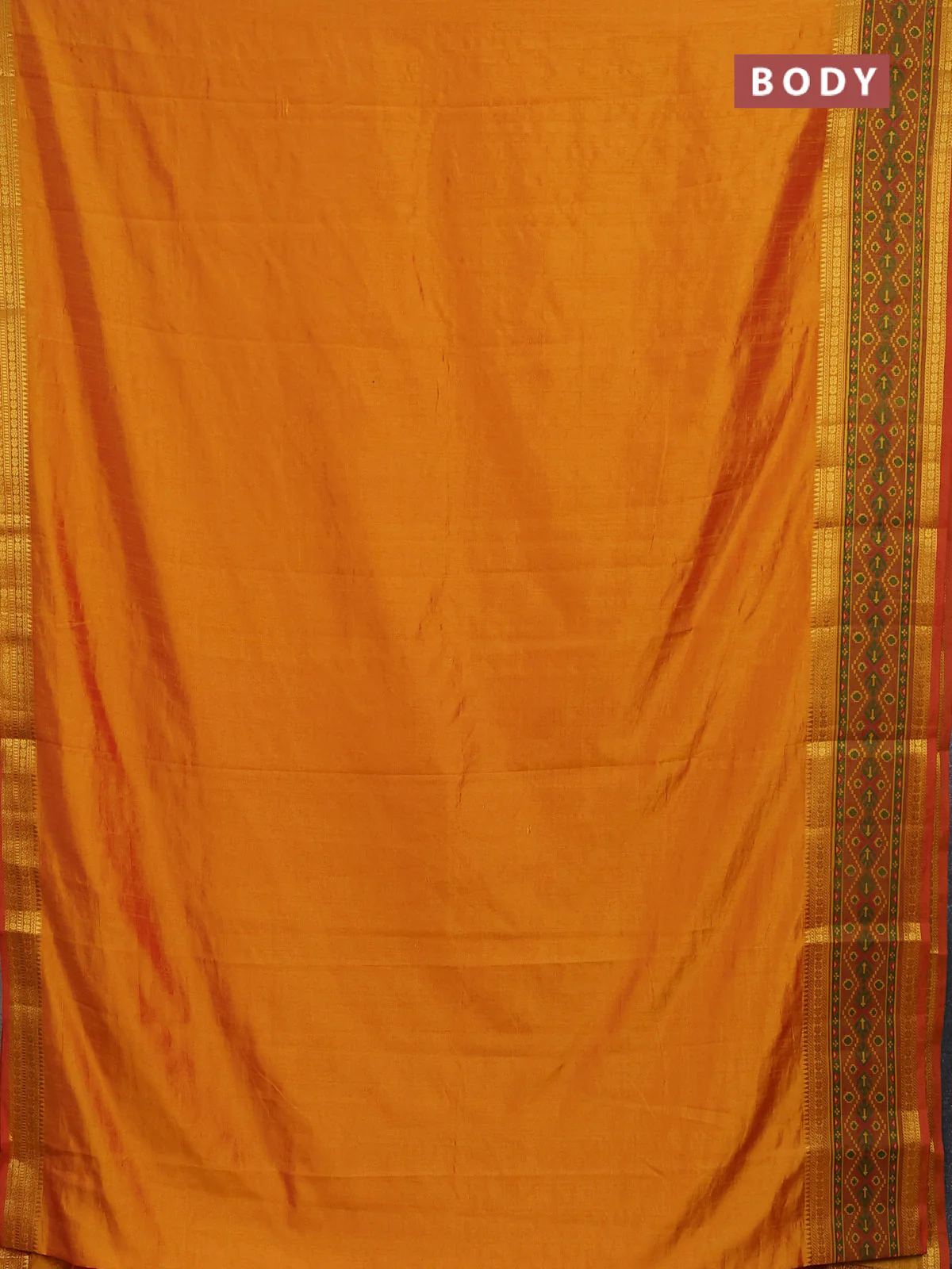 Semi tussar saree dual shade of mustard yellow and red with plain body and ikat woven zari border - Image 2