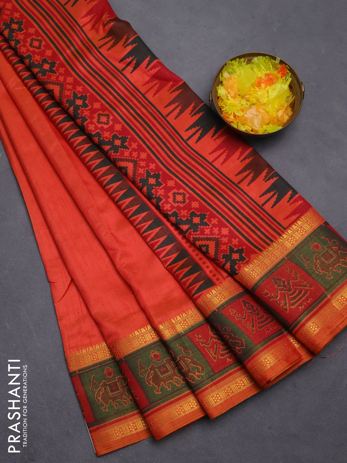 Semi tussar saree dual shade of orange with plain body and ikat woven zari border