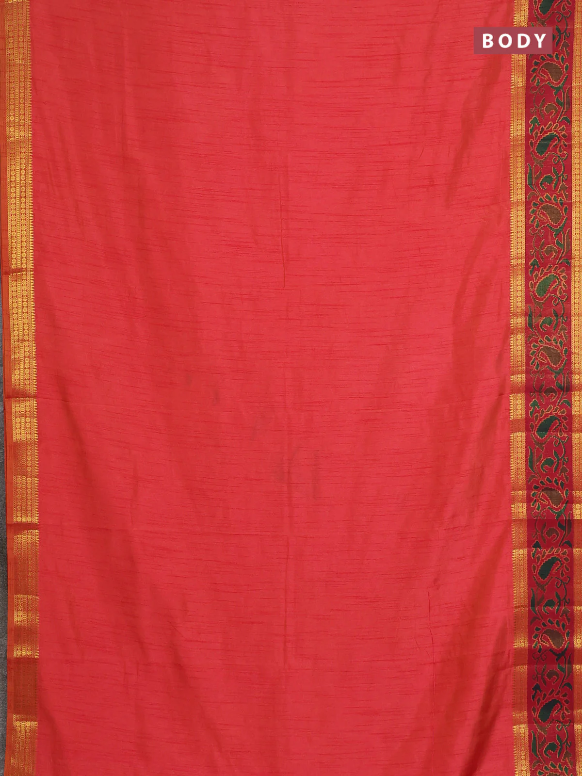 Semi tussar saree dual shade of pinkish orange and maroon with plain body and ikat woven zari border - Image 2