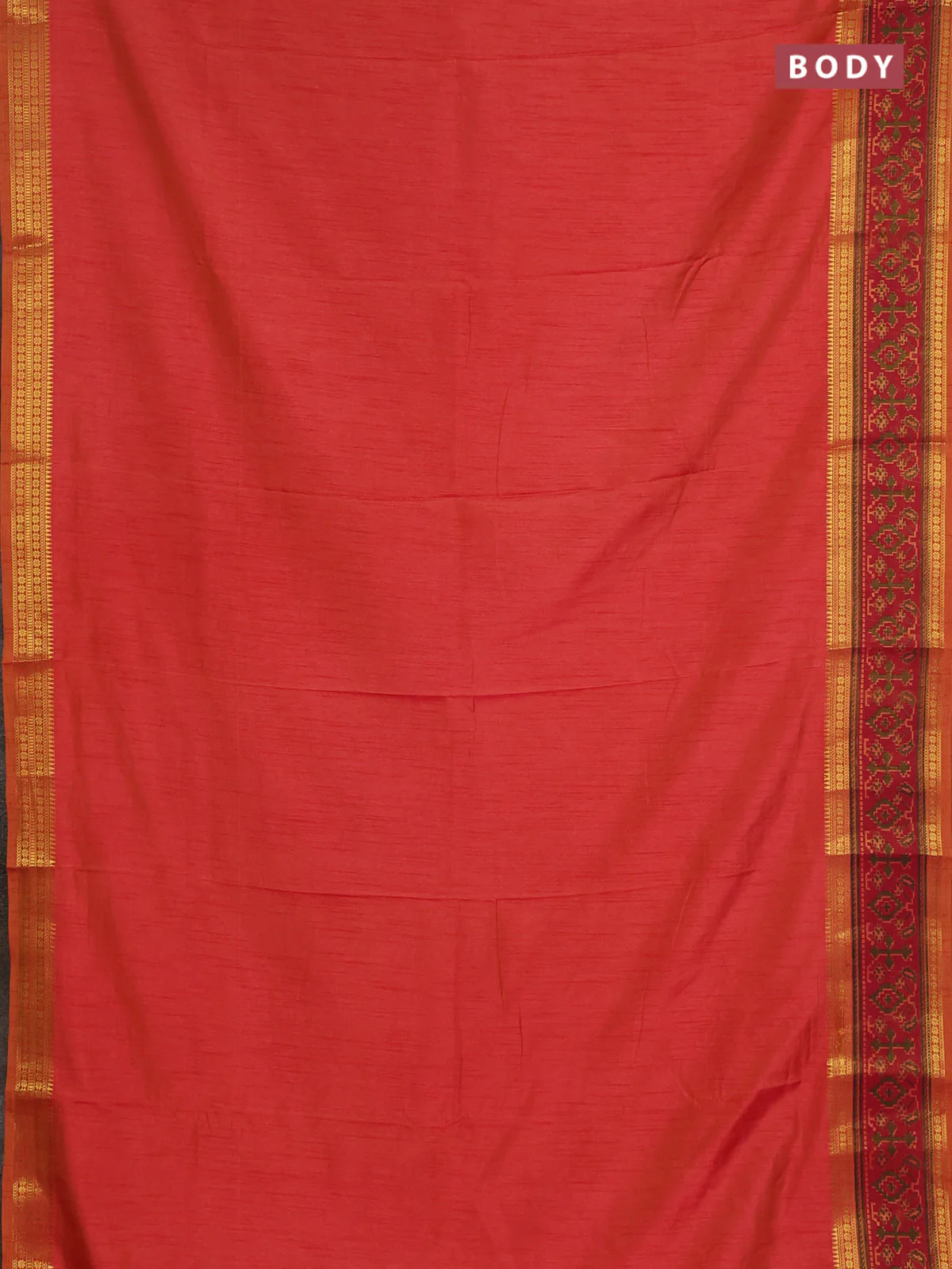 Semi tussar saree dual shade of pinkish orange and maroon with plain body and ikat woven zari border - Image 2