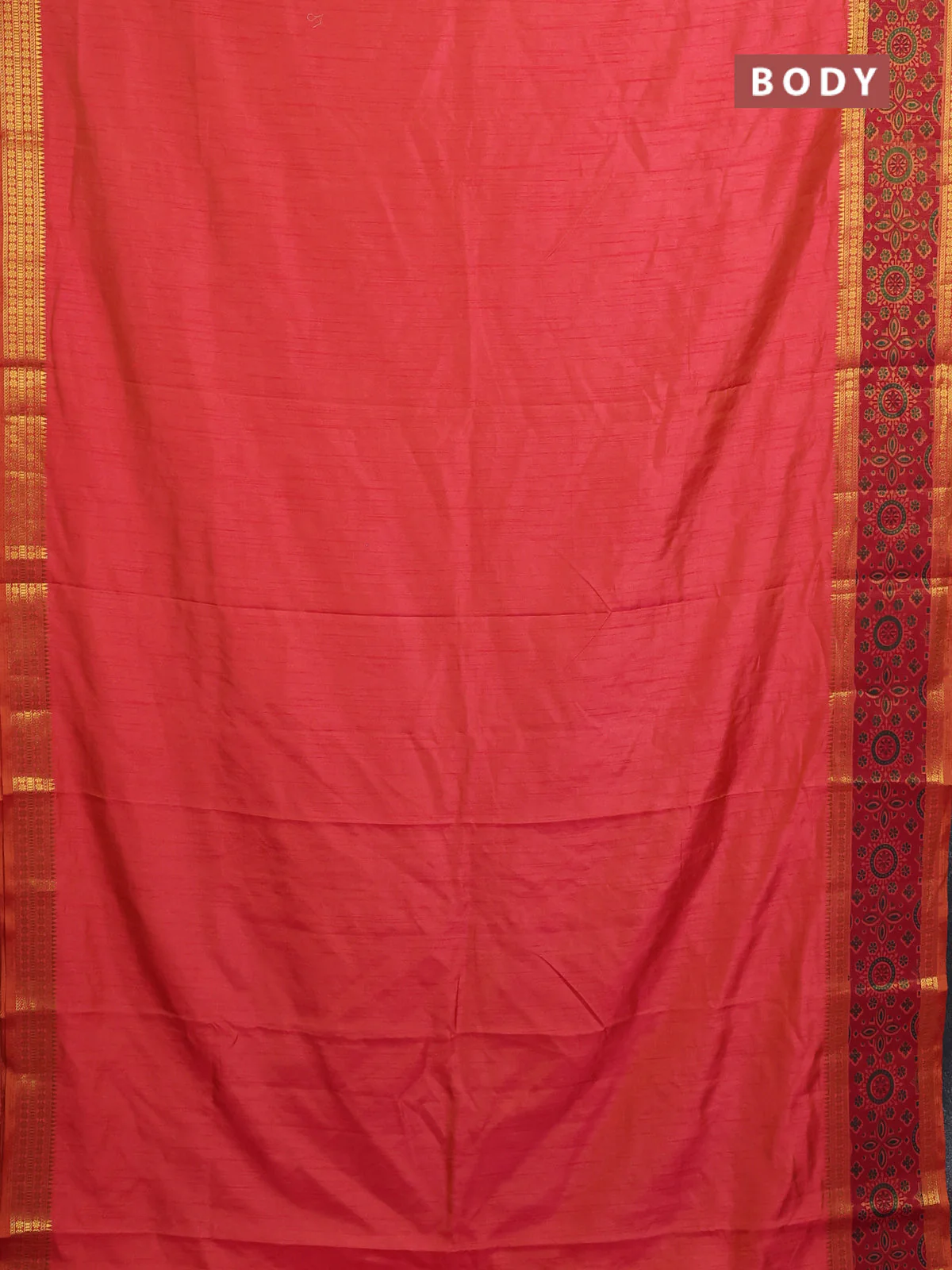 Semi tussar saree dual shade of pinkish orange with plain body and ikat woven zari border - Image 2