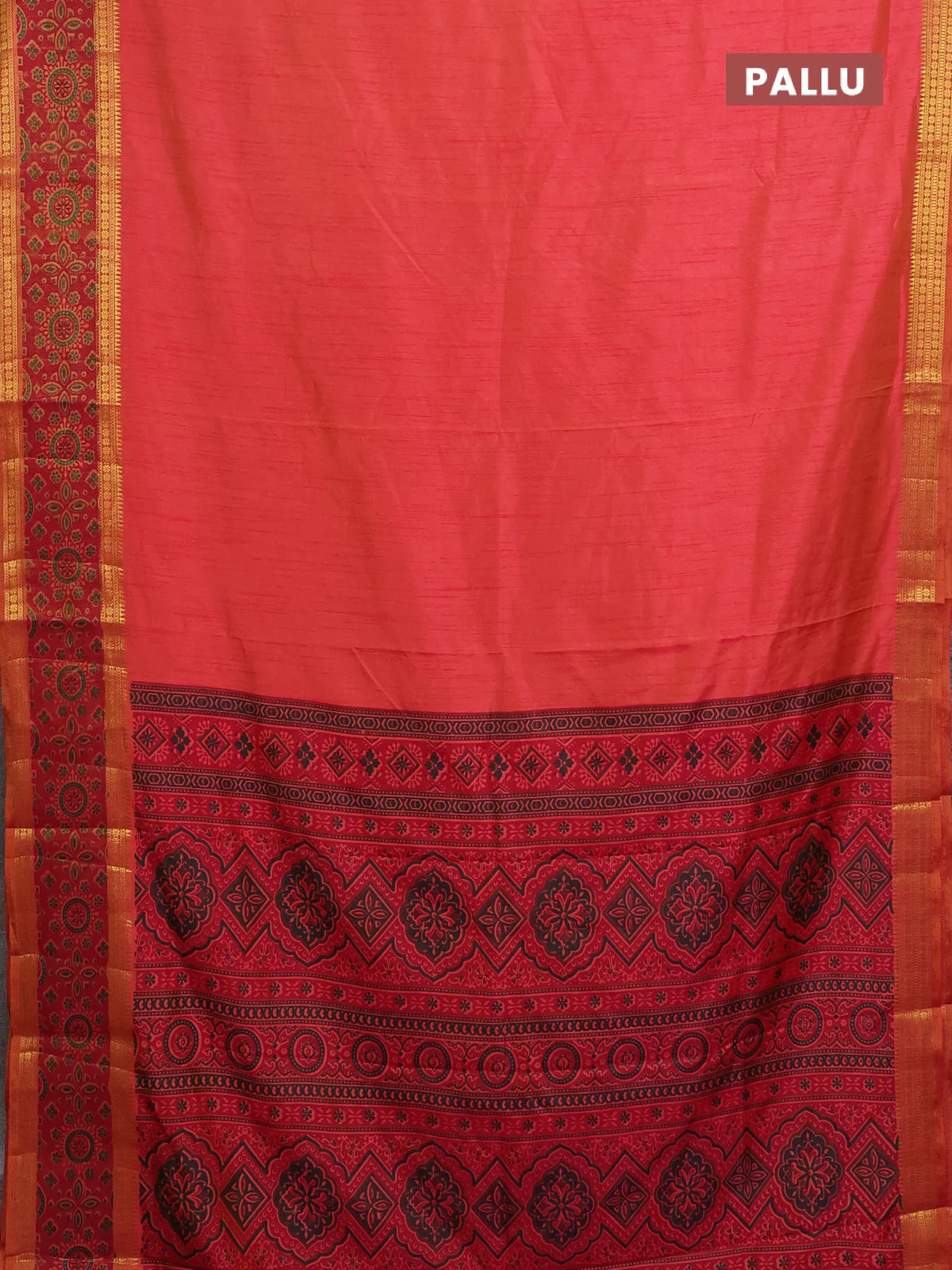 Semi tussar saree dual shade of pinkish orange with plain body and ikat woven zari border - Image 3