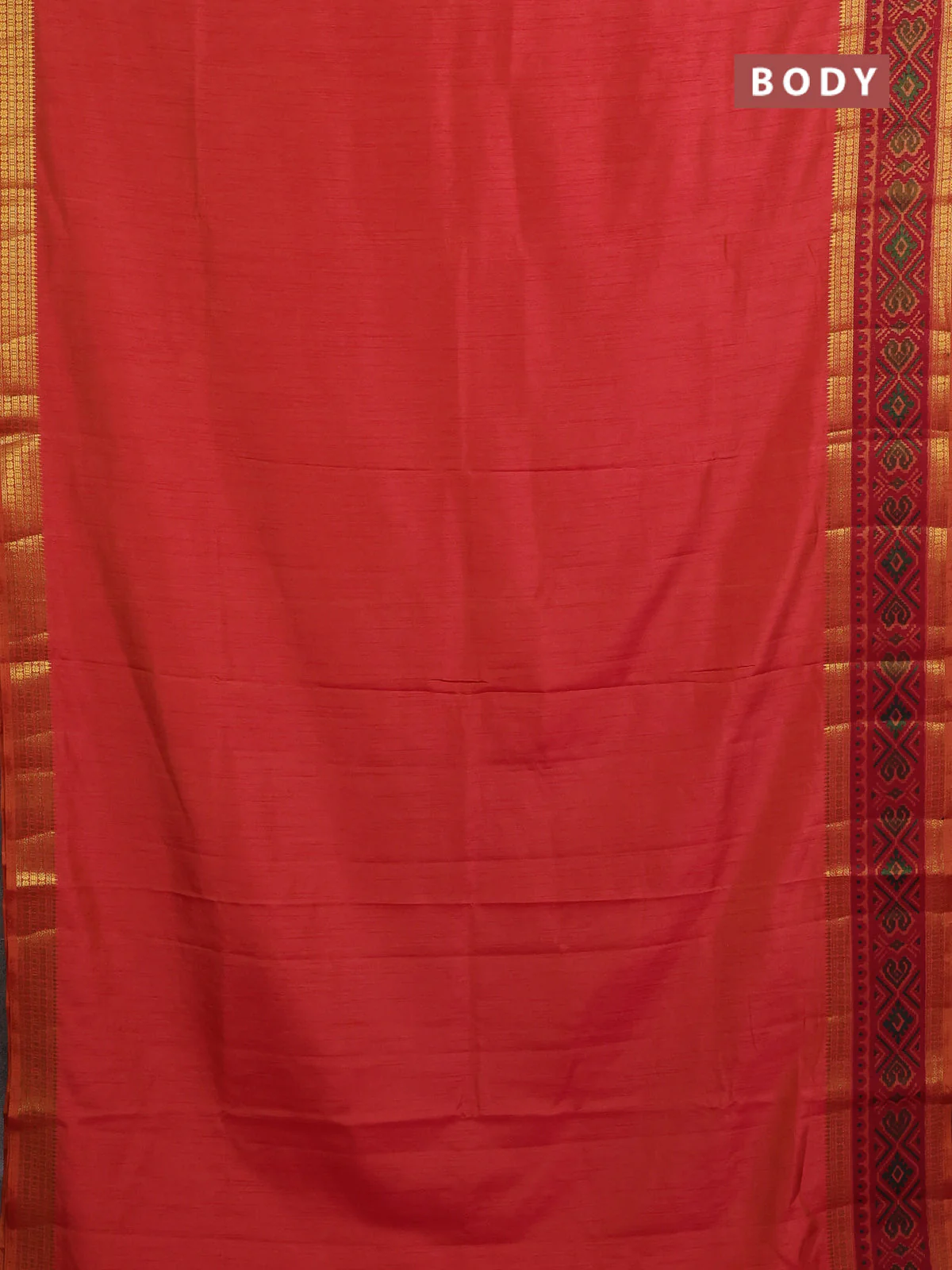 Semi tussar saree dual shade of pinkish orange with plain body and ikat woven zari border - Image 2