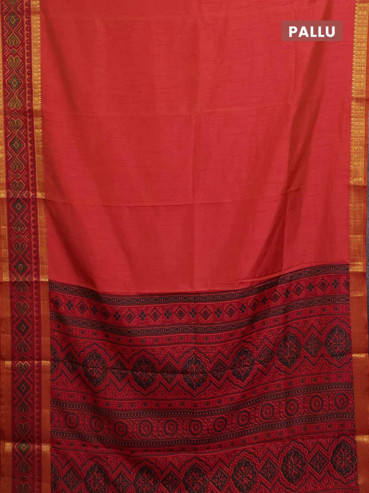Semi tussar saree dual shade of pinkish orange with plain body and ikat woven zari border - Image 3