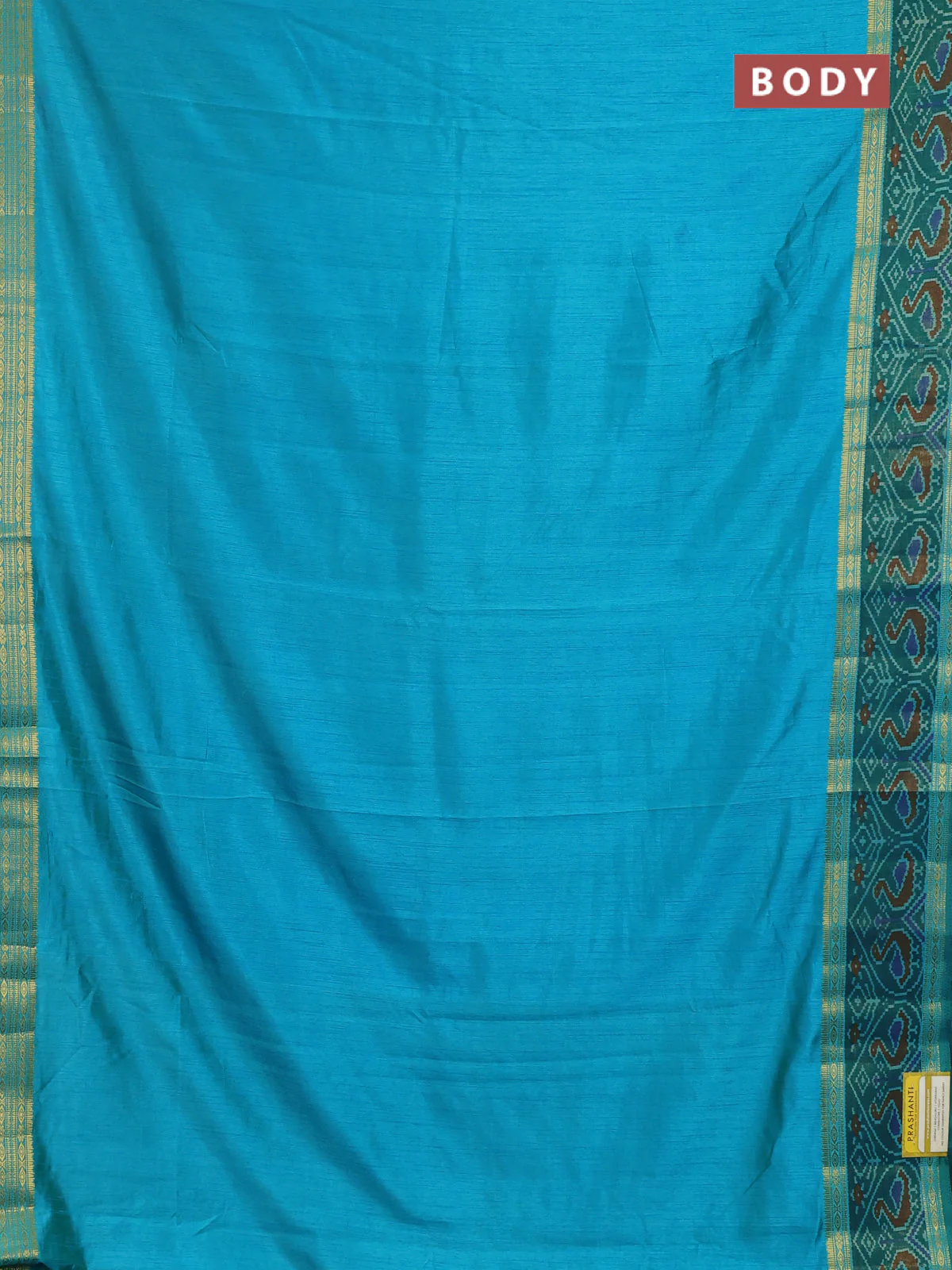 Semi tussar saree dual shade of teal blue and green with plain body and ikat woven zari border - Image 2