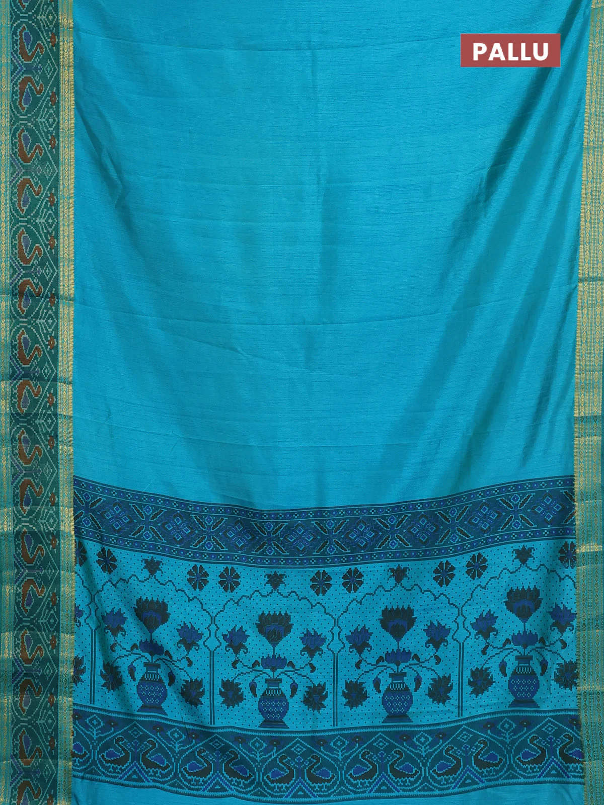 Semi tussar saree dual shade of teal blue and green with plain body and ikat woven zari border - Image 3