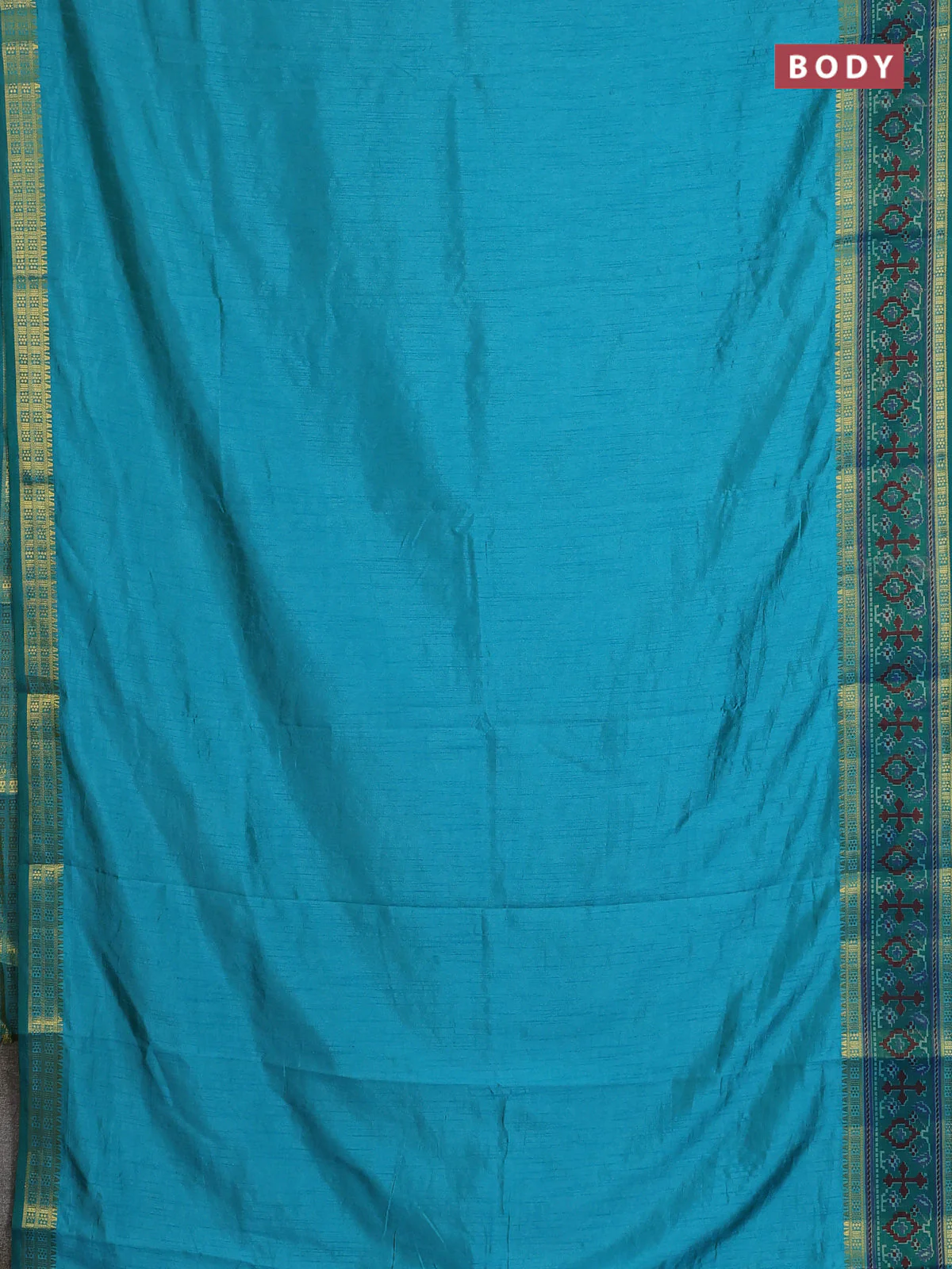 Semi tussar saree dual shade of teal blue and green with plain body and ikat woven zari border - Image 2