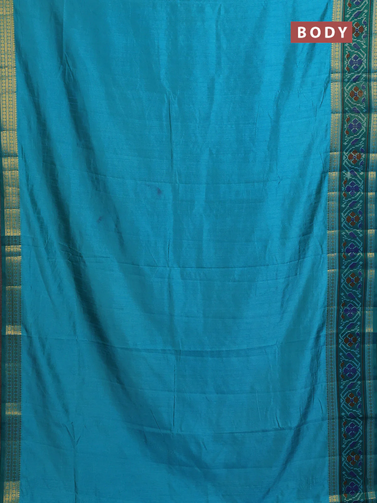 Semi tussar saree dual shade of teal blue and teal green with plain body and ikat woven zari border - Image 2