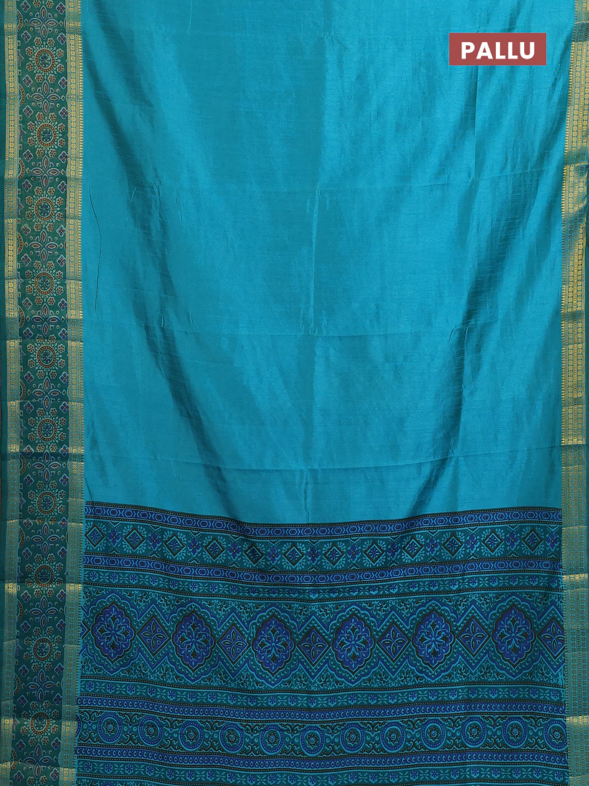 Semi tussar saree dual shade of teal blue with plain body and ikat woven zari border - Image 3