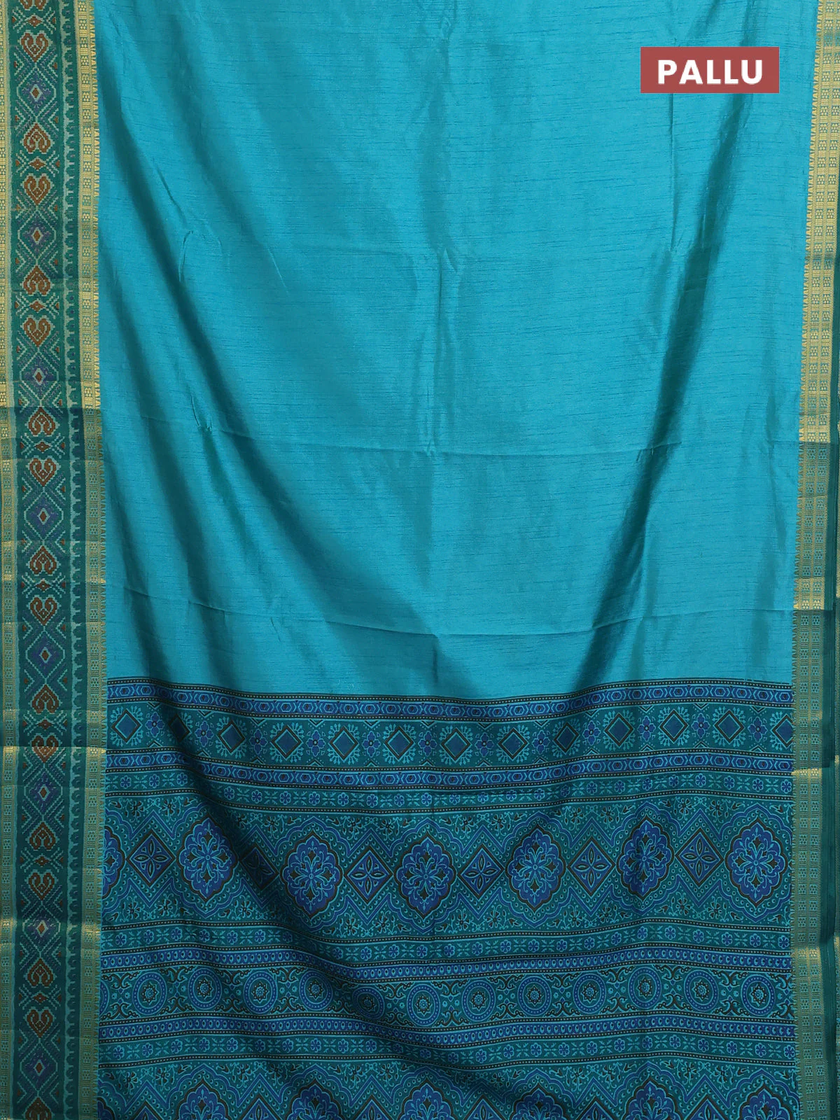 Semi tussar saree dual shade of teal blue with plain body and ikat woven zari border - Image 3