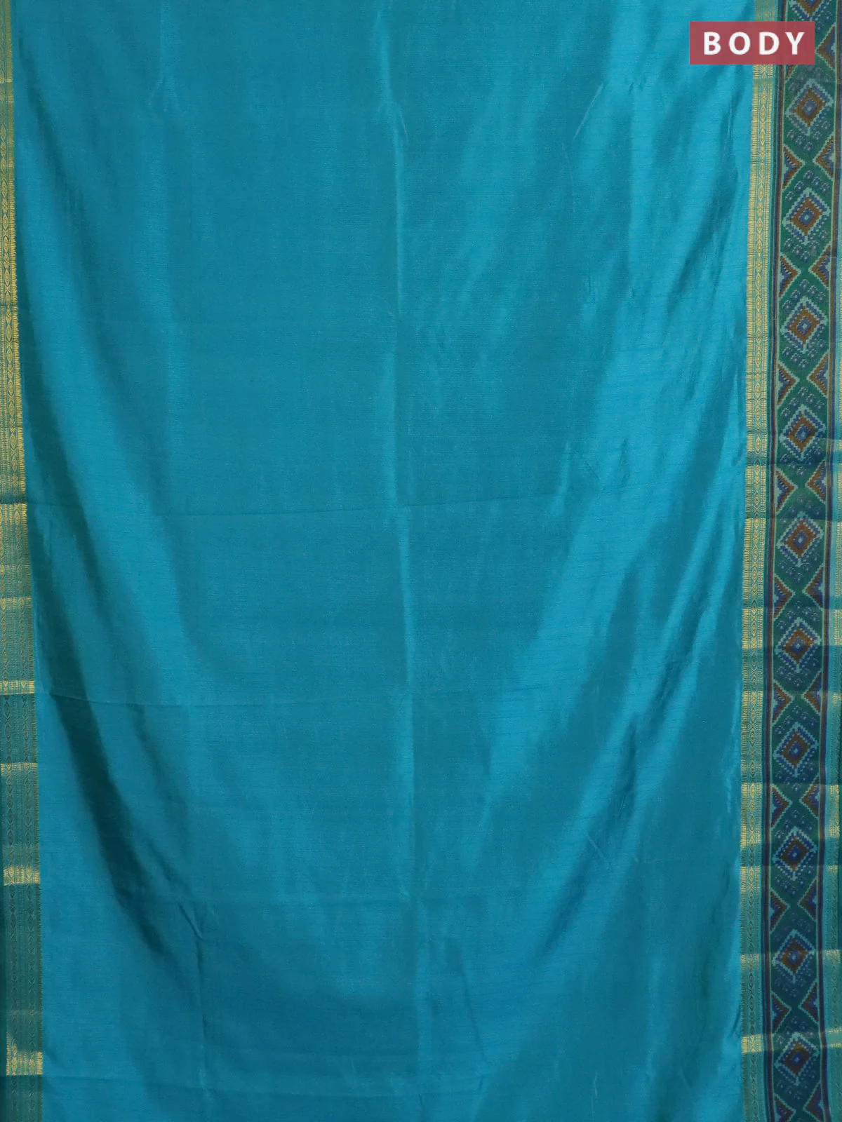 Semi tussar saree dual shade of teal blue with plain body and ikat woven zari border - Image 2