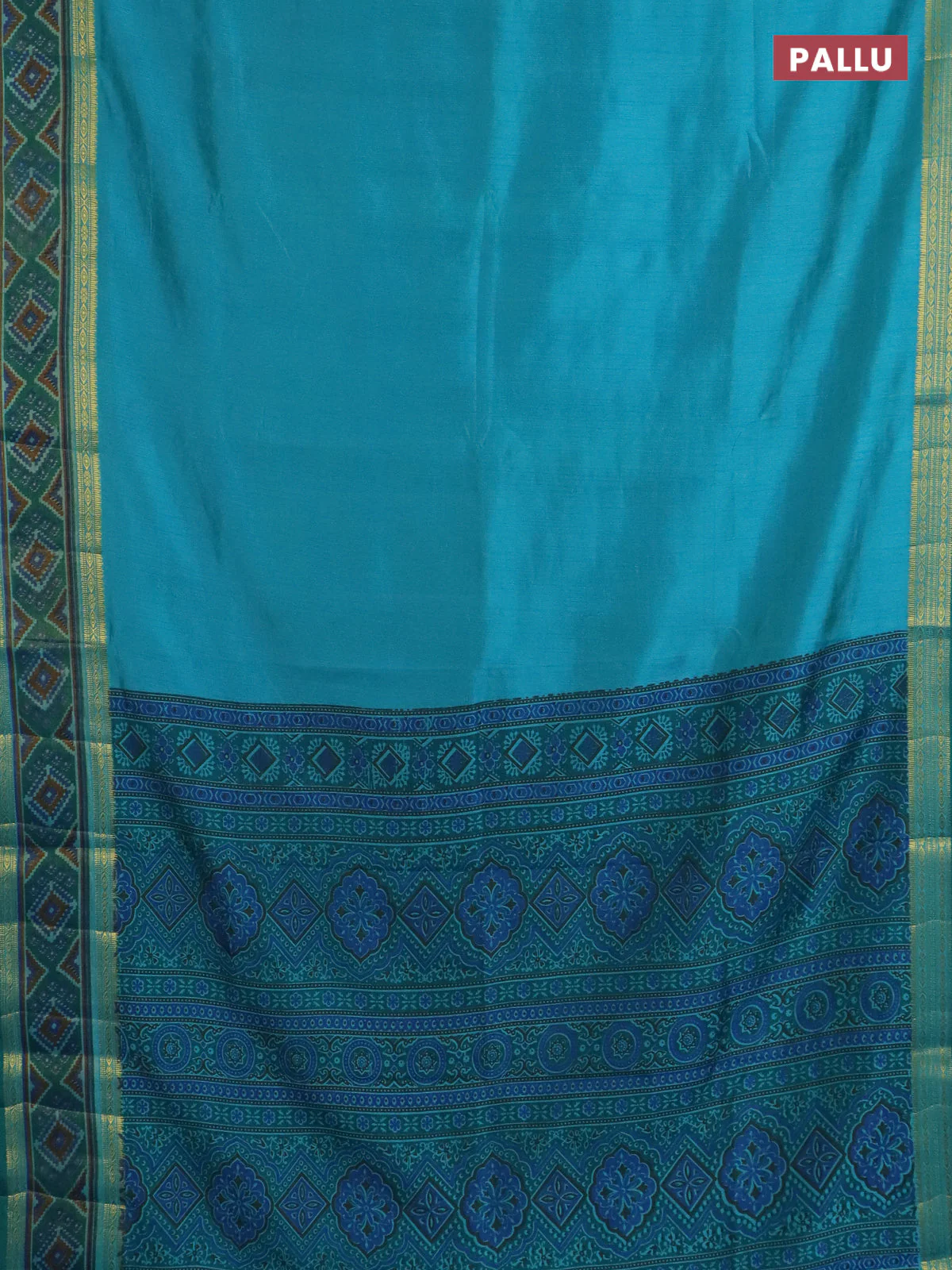 Semi tussar saree dual shade of teal blue with plain body and ikat woven zari border - Image 3