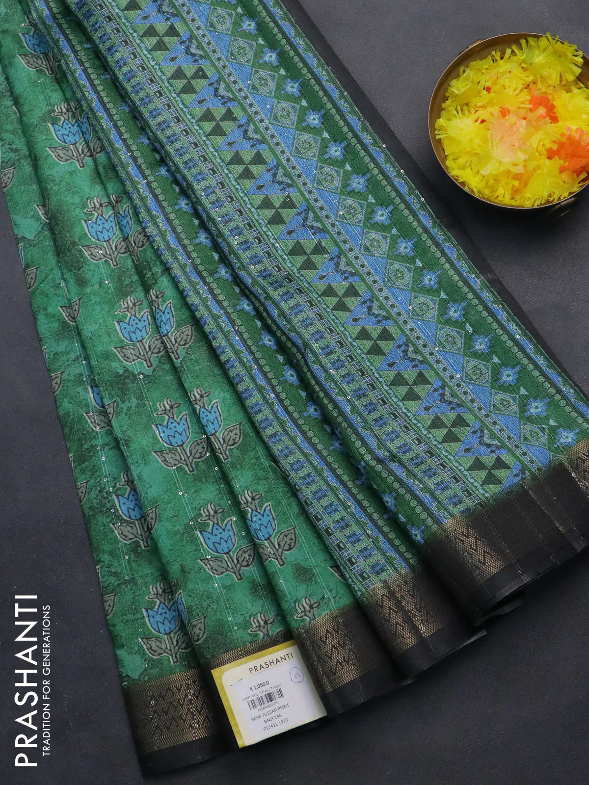 Semi tussar saree green and black with floral butta prints & sequin work and zari woven border