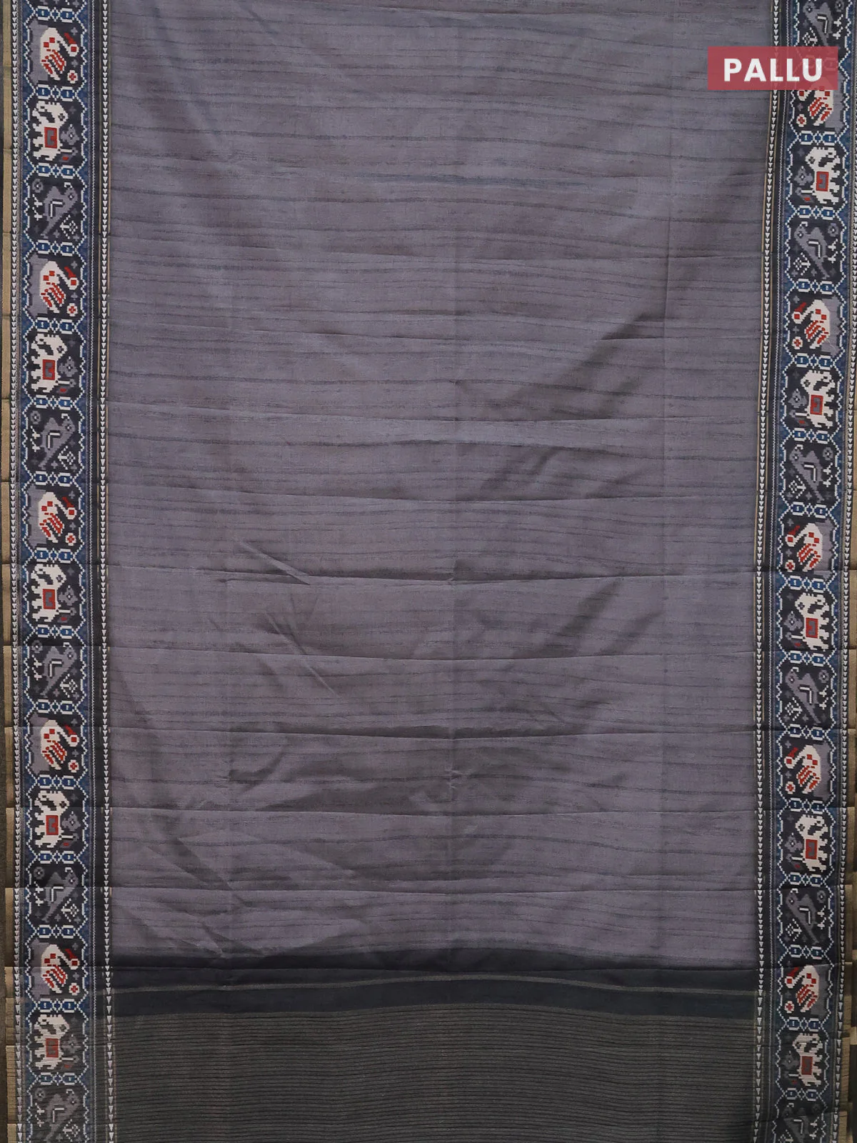 Semi tussar saree grey and dark grey with plain body and patola printed border - Image 3