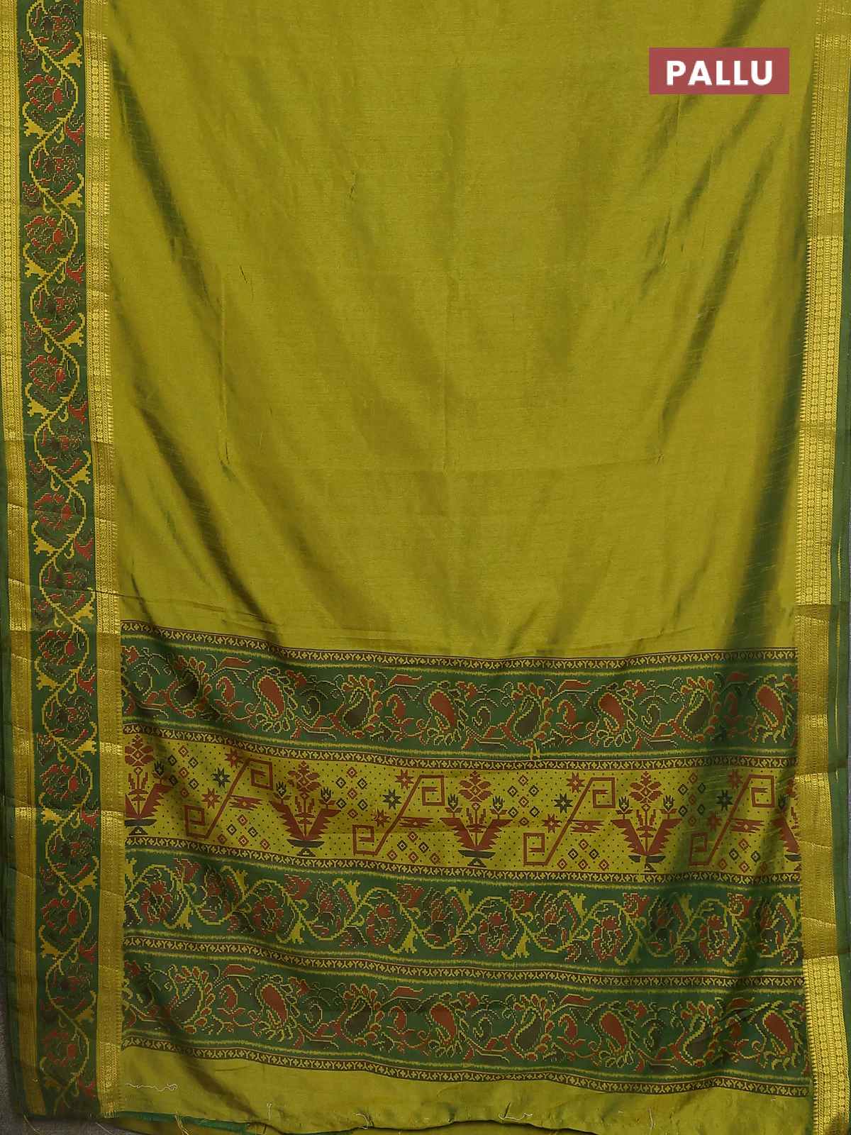Semi tussar saree light green and green with plain body and ikat woven zari border - Image 3