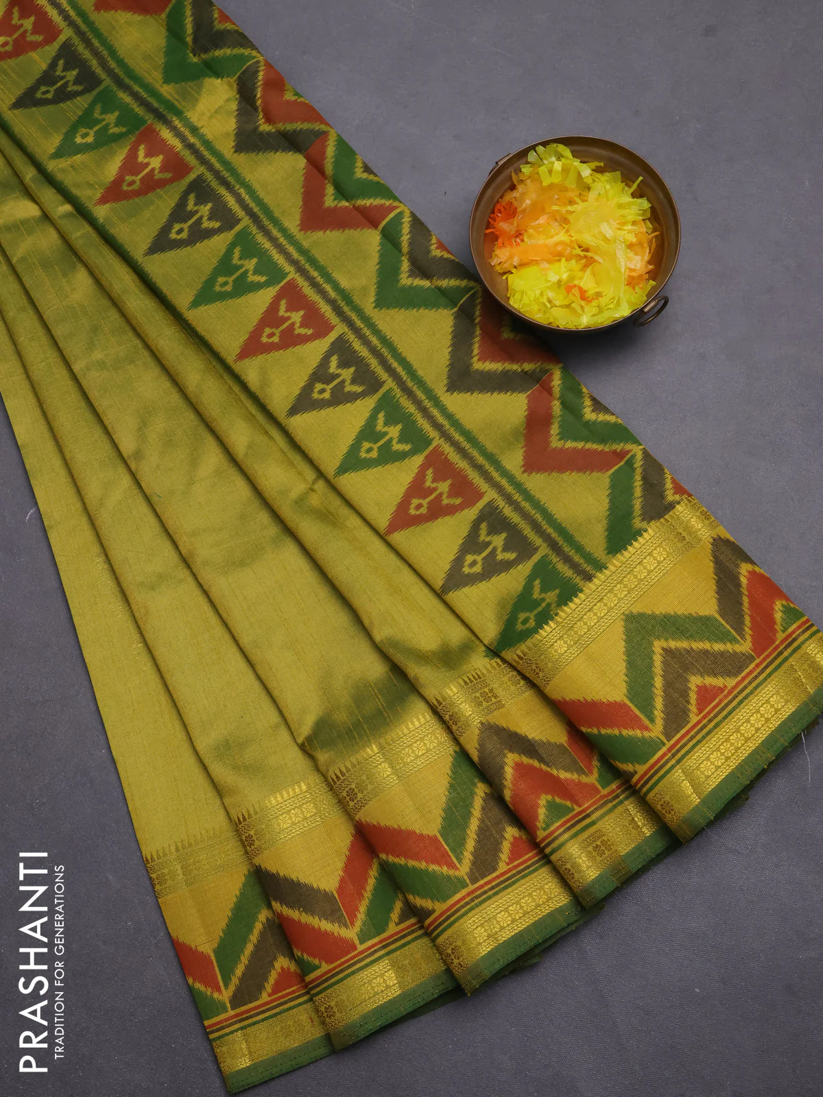 Semi tussar saree light green with plain body and ikat woven zari border